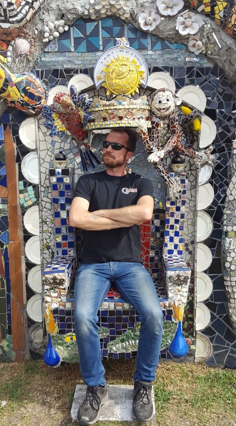 Our CEO posing in front of a silver and blue balloon backdrop, celebrating an event with WBSAV’s signature mix of fun and professionalism.